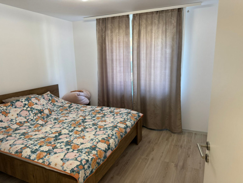 Apartament modern si spatios cu curte privată 