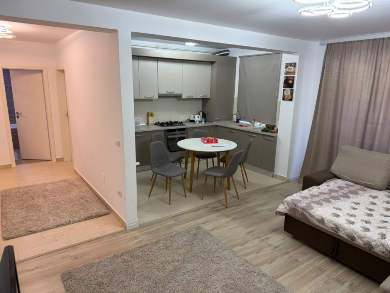 Apartament modern si spatios cu curte privată 
