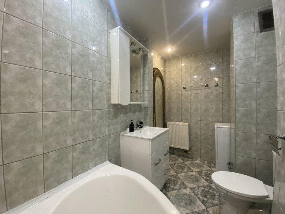 Apartament 2 camere decomandat– Strada Zizinului, în spate la Județean